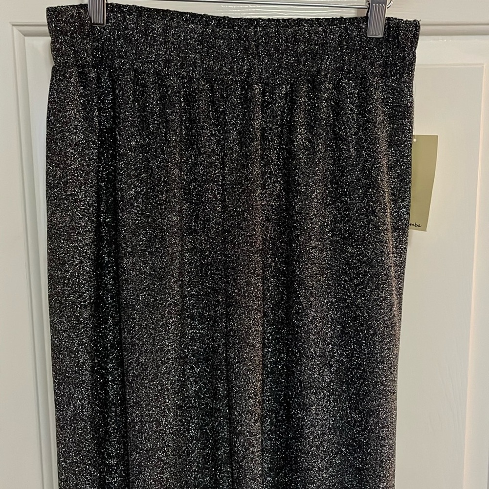 Brand new boutique black sparkly pants size large by Live To Be Spoiled.
